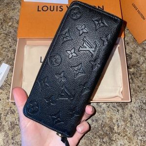 Authentic Louis Vuitton Clemence Wallet in Monogram Empreinte Leather.